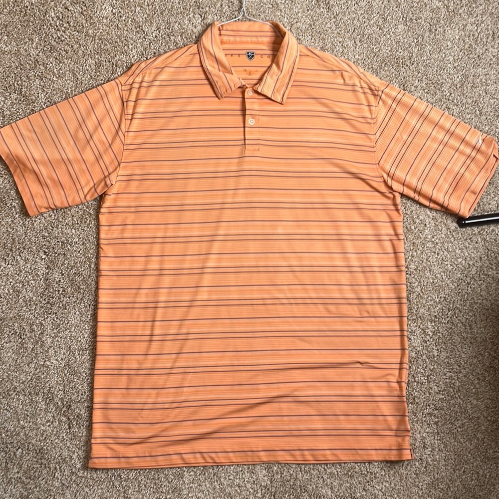 Orange striped Nike golf shirt